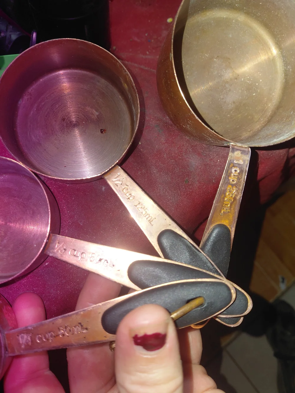 set of copper-plated stainless steel measuring cups